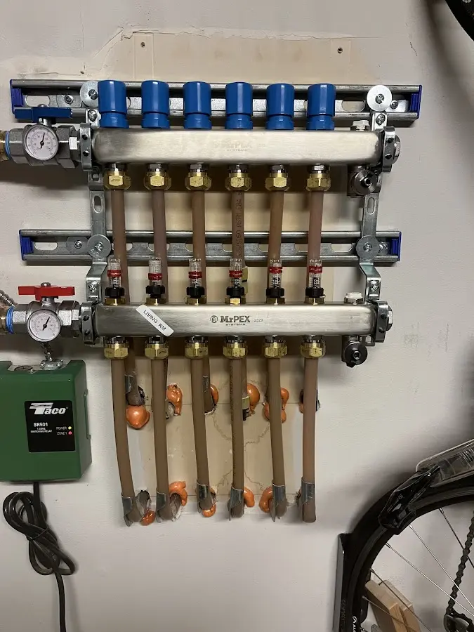 Plumber performing Gas Line Installation at a residential property in Shenandoah