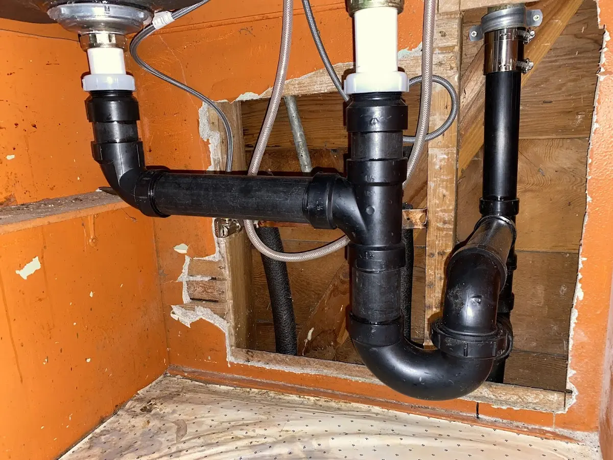 Professional Garbage Disposal Repair equipment and tools on the job in Shenandoah
